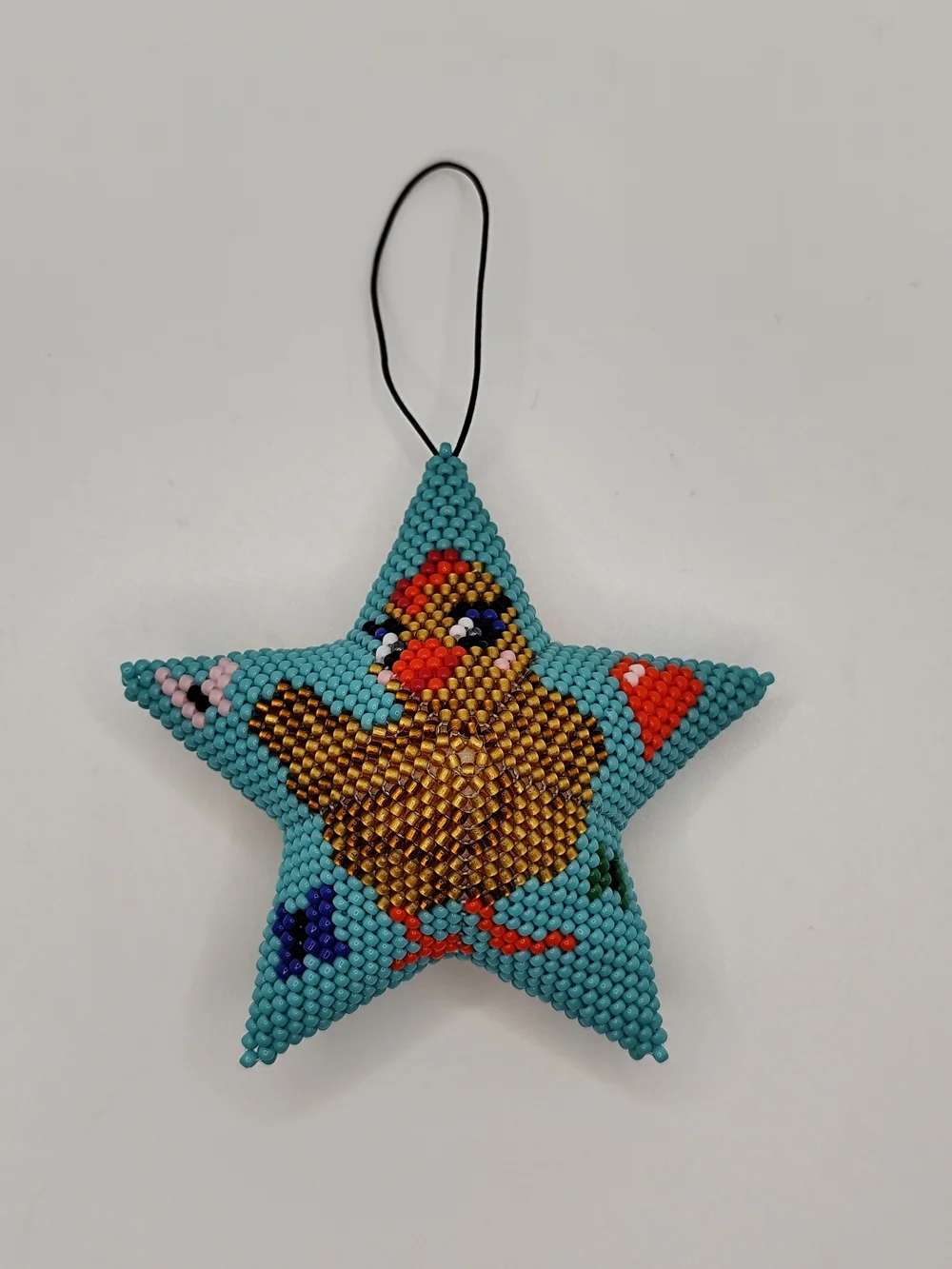 Handmade Turquoise Star Ornament with Beaded Chick Motif